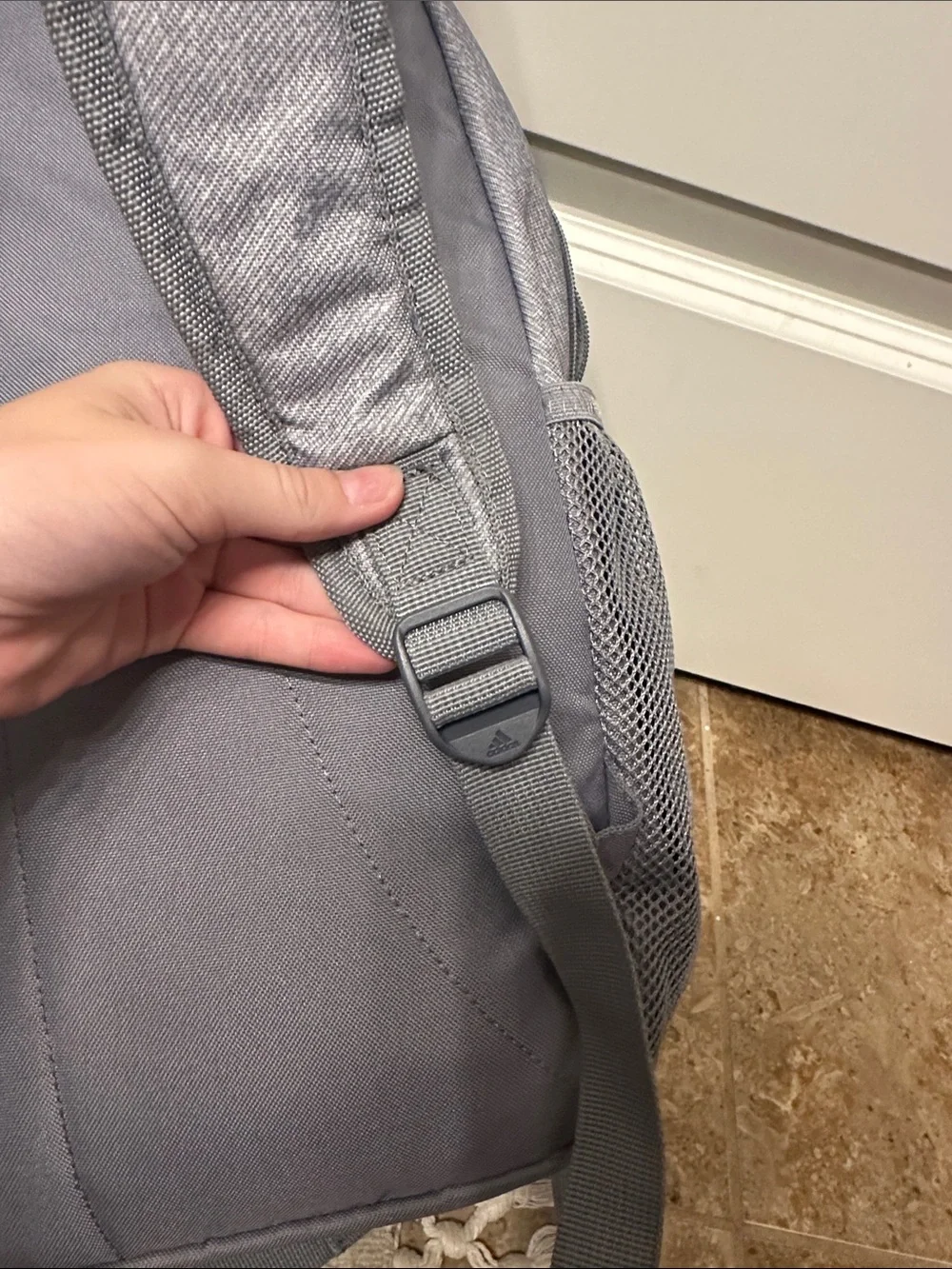 adidas Light Gray Backpack with Gold Logo Accents